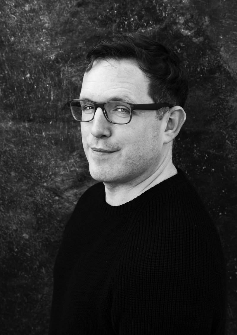 Adam McOmber author photo - black and white portrait